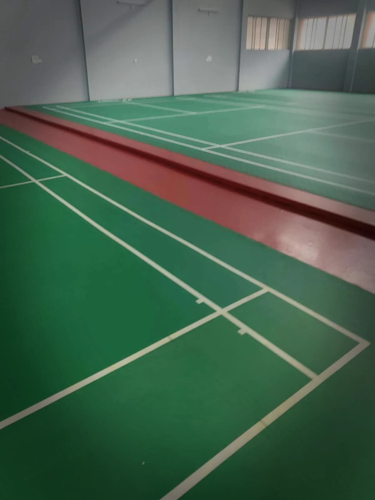 A tournament mat rolled over a finished court